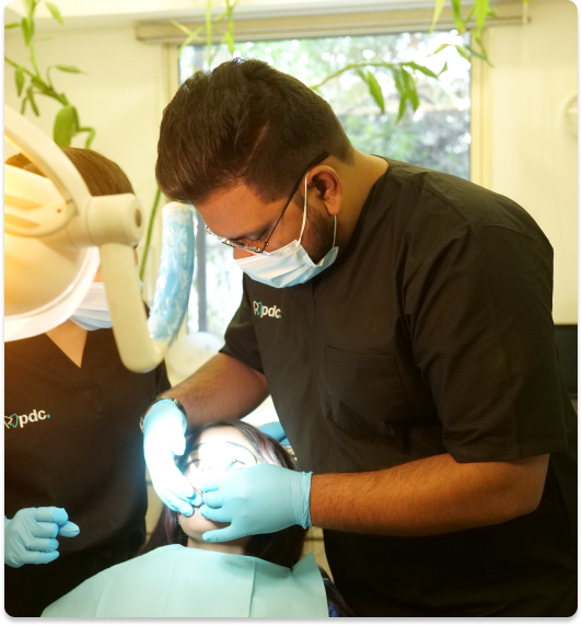 PDC specialist providing dental care