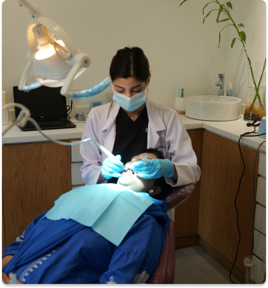 Specialist providing dental care